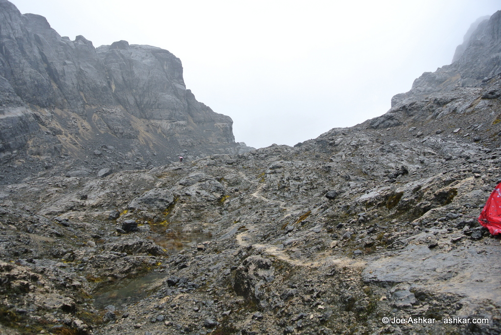Coming down into Carstensz Base Camp.