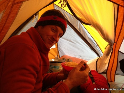 Garrett enjoying hot drinks and soup.