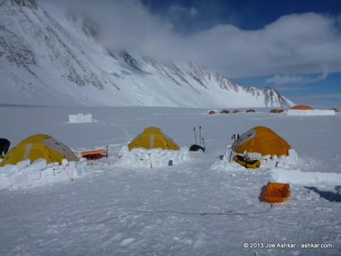 Ice walls sheltering tents from the wind at Vinson Low Camp.