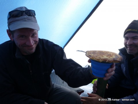 Tom enjoying a big pancake for breakfast.